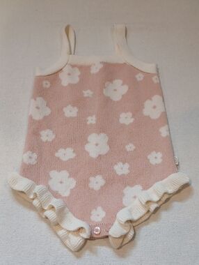 Smug Knit Pink Baby Romper with Cream Trim